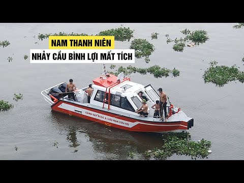 bo lai xe may tren cau binh loi chang trai gieo minh xuong song sai gon