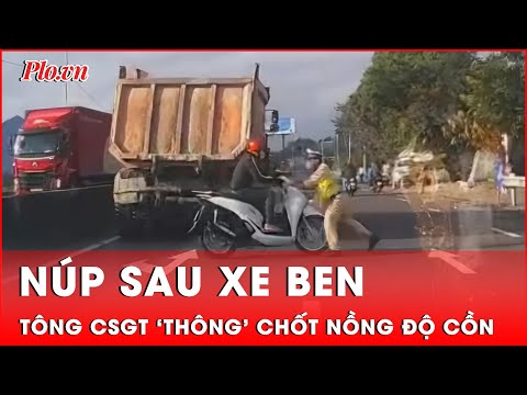 nup sau xe ben nguoi dan ong chay xe may tong csgt thong chot kiem tra nong do con thoi su