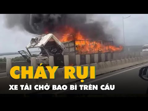 xe tai cho bao bi chay rui tren cau long thanh phong toa 2 lan